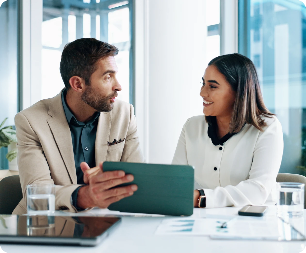 Professionals collaborating in modern office space