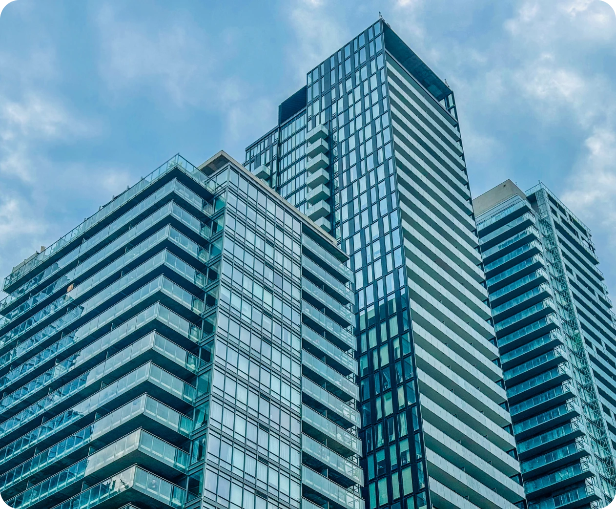 Urban high-rise buildings under blue sky